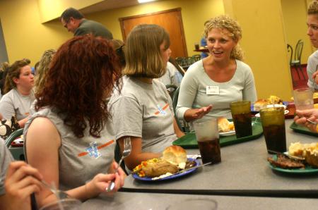 Lori Nolen, assistant professor of art, talks with Lori Landon, of Memphis, Tenn., and Elisabeth Crecink, of Virginia Beach, Vir., during the Dinner with your Department event at New Student Orientation. - Photo by Stephanie Schroeder