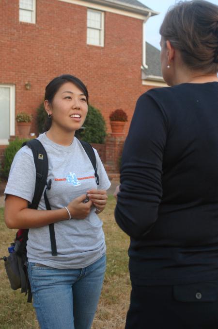 Sarah Kim, a pre-med transfer student from Livingston, N.J., talks with Provost Carla Sanderson at the annual ice cream social held at President Dockery's home. - Photo by Stephanie Schroeder