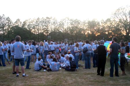 Freshmen and FOCUS Leaders gathered in President Dockery's backyard for some ice cream and fun during new student orientation. - Photo by Stephanie Schroeder