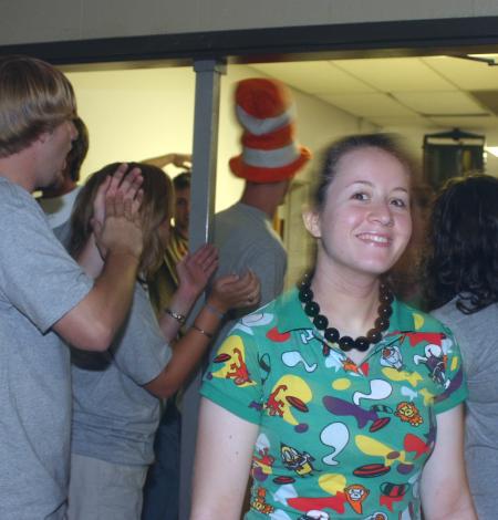 Kesley Nagey, a graphic design major from Memphis, flashes a smile as she is welcomed into the small gym for a Life Group presentation. - Photo by Stephanie Schroeder