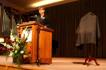 Provost Carla Sanderson presented a tribute to Kyle L. Hathcox during his memorial service. - Photo by Stephanie Schroeder