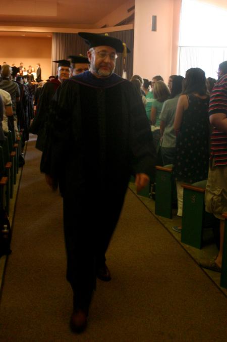 Richard Joiner and other faculty members proceed through the recessional at the end of fall convocation. - Photo by Stephanie Schroeder
