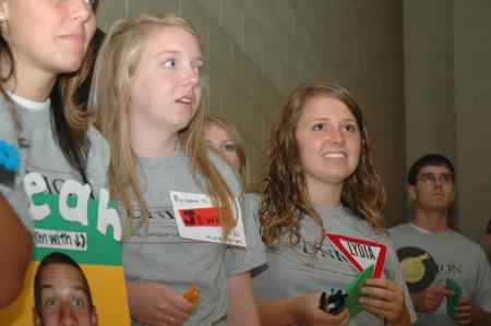Junior Lydia Marshall watches the video presenting Life Groups to the new students. - Photo by Neisha Fuson