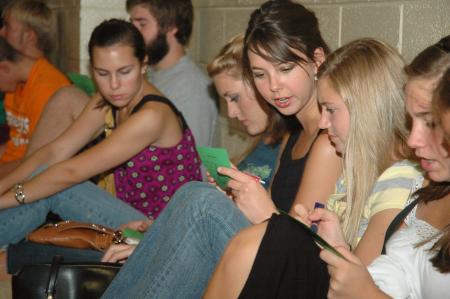 Freshman Katie Mohler signs up for Life Groups with her fellow incoming freshmen.  - Photo by Neisha Fuson