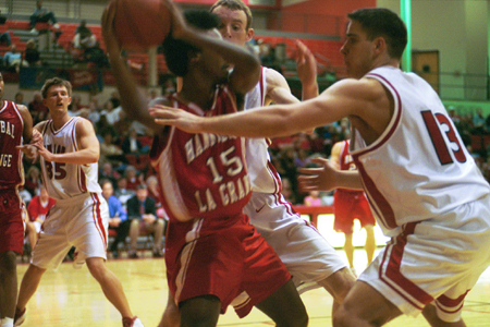 Junior Mike Simpson and Sophomore Matt Noah press Hannibal La-Grange's point guard. - Photo by Justin Veneman