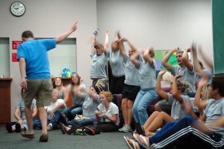 Andrew Courtner and other Focus leaders hosted the Open Mic night and start the party with a few rounds of the Wave. - Photo by Neisha Fuson