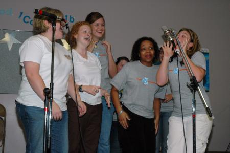 The transfer Focus group, co-led by Lily Zopfi, decided to join in on the fun at Open Mic night by singing a song together.  - Photo by Neisha Fuson
