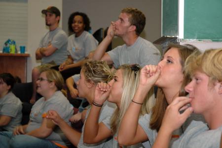 New students have already been taught the dart game by upperclassmen during the Open Mic night.  - Photo by Neisha Fuson