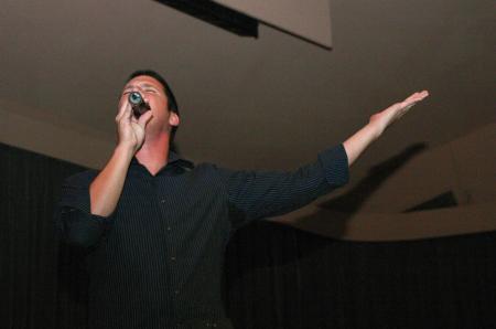 Dave Darty belts out a number during the talent portion of Mr. Campus, an event sponsored by PRSSA. - Photo by Stephanie Schroeder