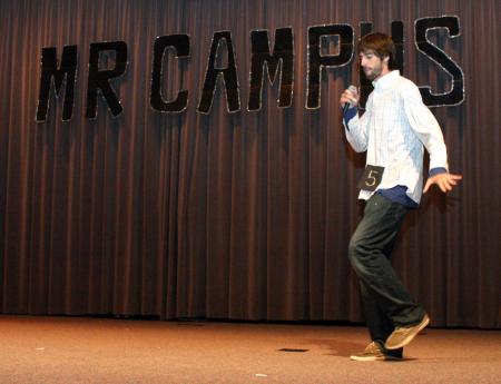 Sophomore Michael Grubb sings and dances to the popular song Baby One More Time as part of his talent show for Mr. Campus. - Photo by Stephanie Schroeder
