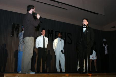 Emcee Joe Garner asks Scott McSwain a question during the interview portion of Mr. Campus. - Photo by Stephanie Schroeder
