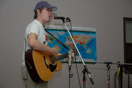 Senior Brian Emerson sang at Open Mic night about how he never wanted to date a Union girl. Brian is now married. He met his wife at Union.  - Photo by Neisha Fuson