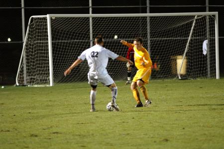 Junior Josh Hanna dribbles past an opponent. - Photo by Matt Elia