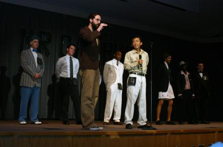 Emcee Joe Garner asks Chawalit Wongkhaio a question during the interview portion of Mr. Campus. - Photo by Stephanie Schroeder