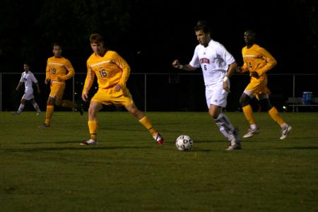 David Romer attempts to make his way down the field while surrounded by opponents from Trevecca Nazarene University. The Bulldogs won 2-1. - Photo by Stephanie Schroeder