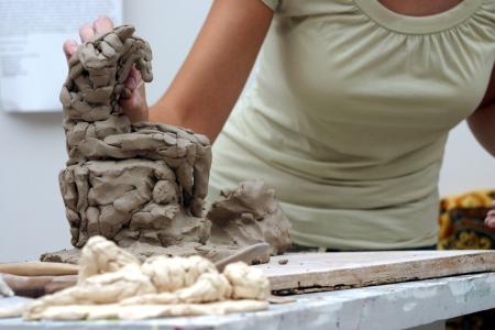 Rebecca Forester sculpts a sketch model for an all day art workshop. - Photo by Stephanie Schroeder