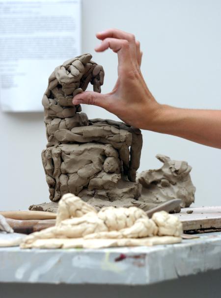 Rebecca Forester sculpts a sketch model for an all day art workshop. - Photo by Stephanie Schroeder