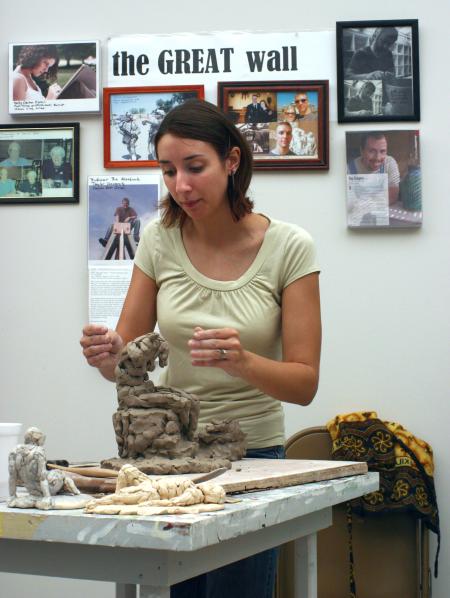 Guest Artist Rebecca Forester sculpts a sketch model for an all day art workshop. - Photo by Stephanie Schroeder