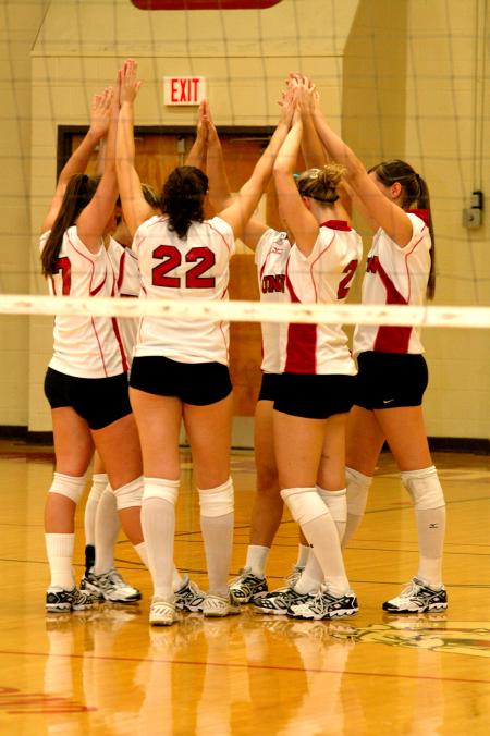 The Union Lady Bulldogs gather before play in a close match against Freed-Hardeman. - Photo by Matt Elia