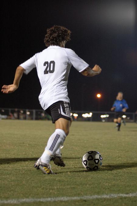 Freshman Edmundo Novarro prepares to kick the ball down field in hopes of setting up a Union shot against Belhaven College.  - Photo by Neisha Fuson