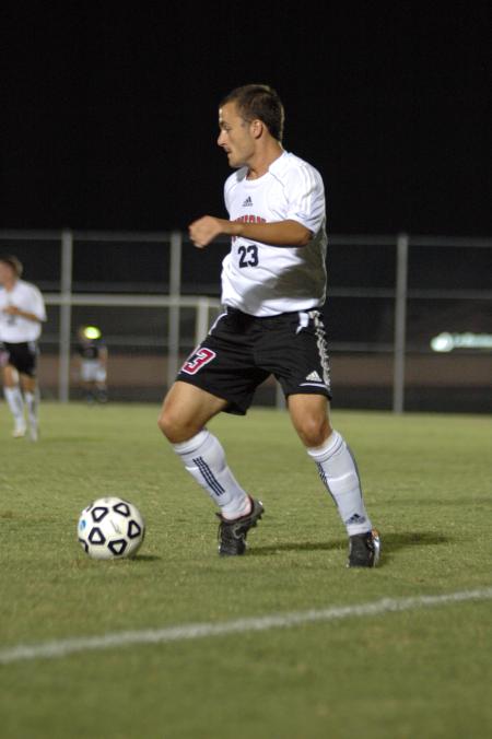 Freshman Franki Mocellin prepares for his next move in Union's match against Belhaven College.  - Photo by Neisha Fuson