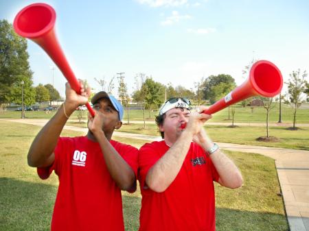 Sophomore Darrion Garrett, pre-med biology major, and senior Josh Clarke, Christain studies major, makes some noise for the Bulldog soccer team. - Photo by Matthew Diggs