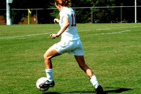 Sophomore Brooke Walker dribbles upfield in a losing effort to UAH, 1-4. - Photo by Matt Elia