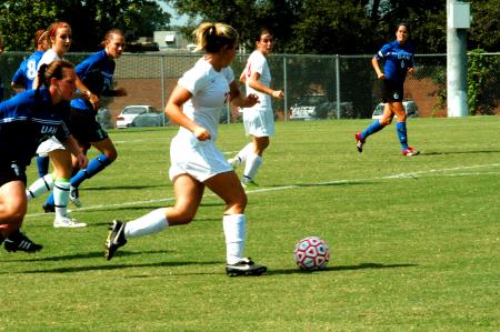 Sophomore Katelin Dirksen drives past a defender. - Photo by Matt Elia