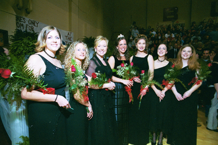 Union's 2003 Homecoming Court.  Pictured from left to right are Amy Edge, Rachel Lovelace, Heather Vaughn, Queen Reagan Carfield, Laura Lee Moore, Sarah Anderson, & Annie Ross. - Photo by Jim Veneman