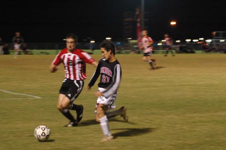 In the match against Martin Methodist College, sophomore Paul Turner pushes himself to gain possession of the ball.  - Photo by Neisha Fuson