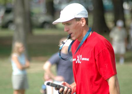 Union cross country head coach Gary Johnson monitors his teams during the Union Invitational. - Photo by Tommy Sadler