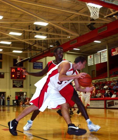 Veljko Petrovic drives past Roland Banhoro in Union's scrimmage during Bulldog Madness. - Photo by Stephanie Schroeder