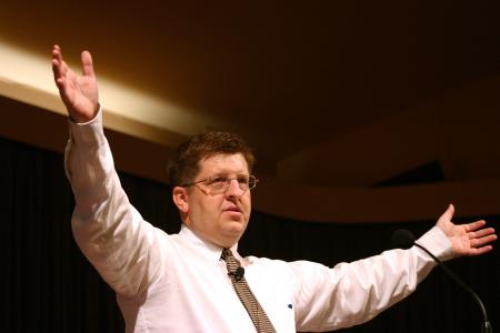 Ray Van Neste, associate professor of Christian studies, talks to students during chapel. - Photo by Stephanie Schroeder