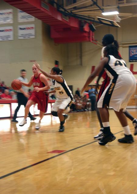 Senior Crystal Eason drives to the basket in the Lady Bulldog's Homecoming win over Harris-Stowe State College (Mo.). - Photo by Stephanie Schroeder