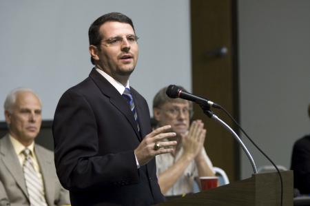 Keith Bates lectures at a history discussion of the recent Ken Burns documentary on World War II. - Photo by Matt Elia