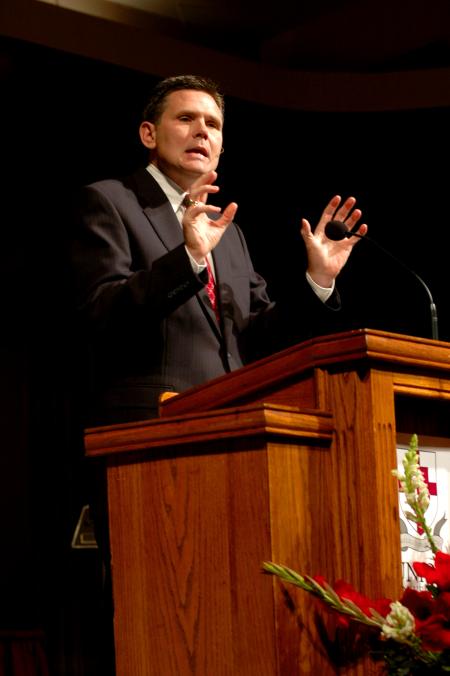 Poplar Heights Baptist Church pastor Patrick McGill addresses students in the Friday chapel service of Homecoming week. - Photo by Matt Elia
