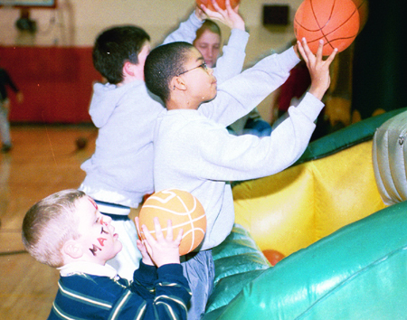 Union's STEA sponsored Family Friendly Activities during Homecoming 2003.  Here some future Bulldogs practice their jumpshots. - Photo by Kristen Hiller