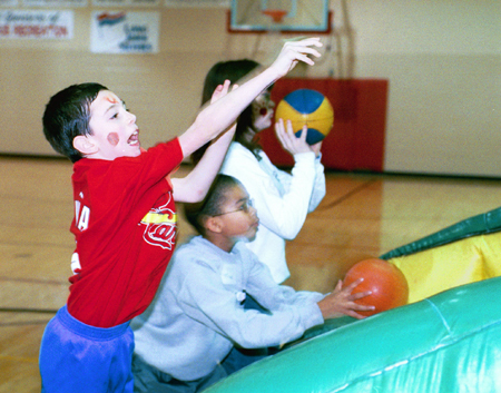 Union's STEA sponsored Family Friendly Activities during Homecoming 2003.  Here some future Bulldogs practice their jumpshots. - Photo by Kristen Hiller