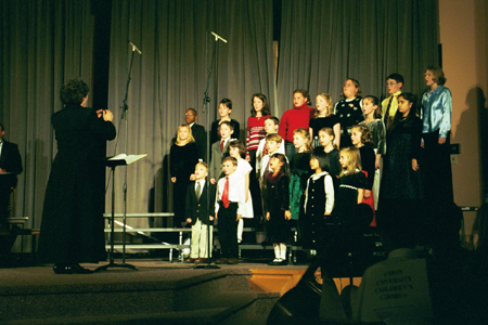 Dr. Betty Bedsole leads a children's choir during <i>A Union Christmas.</i> - Photo by Jim Veneman