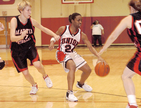 Sophomore Monica Elliot, point guard for the Lady Bulldogs, helped lead the team to a 98-69 win over Martin Methodist College on Thursday, Feb. 27. - Photo by Justin Veneman