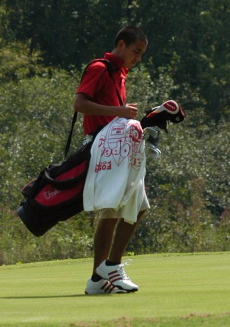 Mills Hamaguchi records his score and takes a breather after completing a hole at Falcon Ridge. - Photo by Steven Aldridge