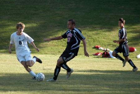 Franki Mocellin gets to the ball ahead of a defender. - Photo by Steven Aldridge