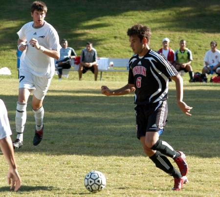 Veiga Guilherme looks for his next move has he possess the ball. - Photo by Steven Aldridge