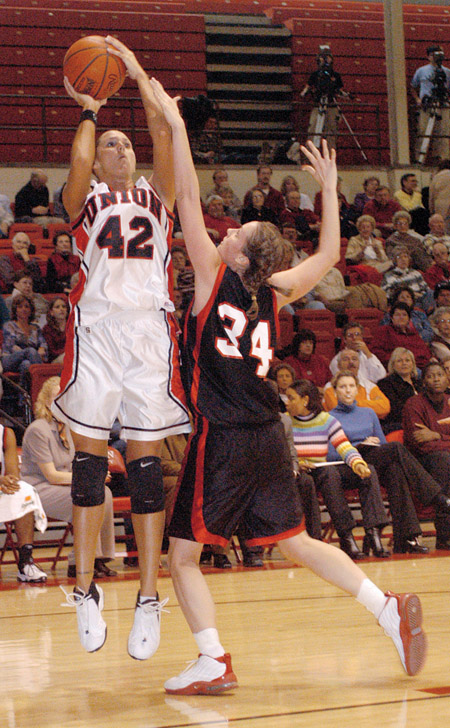 Junior Ginger Bryant goes for two against Martin Methodist. - Photo by Justin Veneman