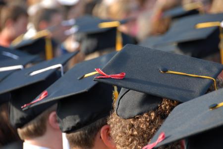 Graduates wore ribbons on their caps to remember Union University and all they went through their last semester, including the tornado on February 5. - Photo by Morris Abernathy