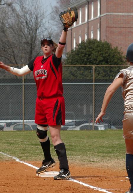 Ashley Blankenship stretches to make the putout at first base. - Photo by Steven Aldridge