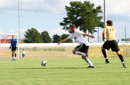 Bulldog defenders work hard to get the ball back on the other end of the field in a game against Oklahoma Baptist University.   - Photo by Kristi McMurry Woody