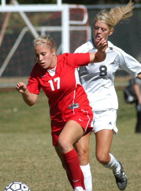 Abigail Williams advances the ball up the field as she out runs her nearest defender. - Photo by Steven Aldridge