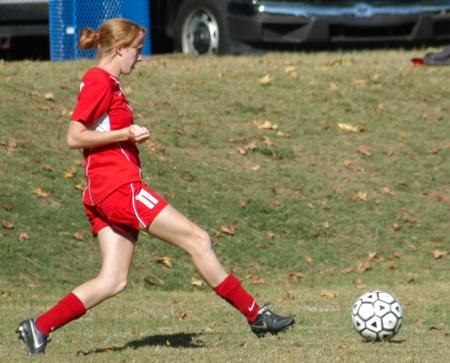 Brooke Walker moves the ball up the field. - Photo by Steven Aldridge