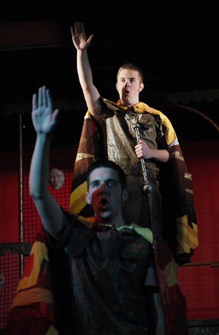 Josh Hussung & Brennan Uthe salute in <i>Philemon</i>. - Photo by Jim Veneman